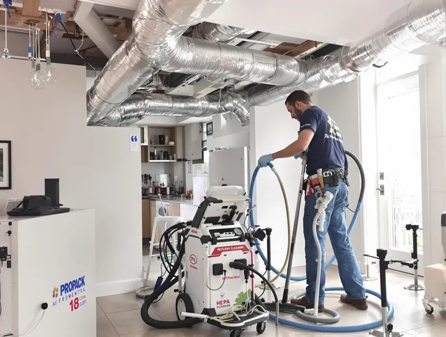 North Smithfield Air Duct Cleaning technician performing advanced pure duct cleaning with specialized equipment in North Smithfield